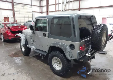 2000 Jeep Wrangler Sport z USA, uszkodzony, nr VIN 1J4FA49S2YP797321